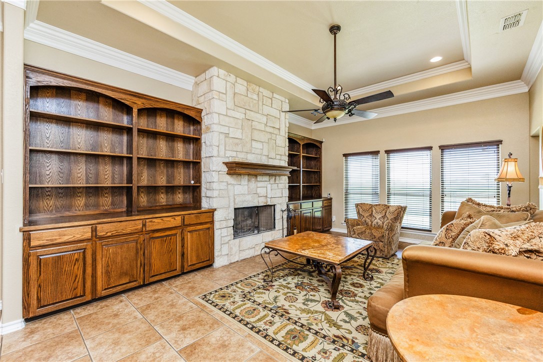 307 Heathercrest Portland, TX 78374 - Photo 3 of 40 a living room with furniture fireplace and a flat screen tv