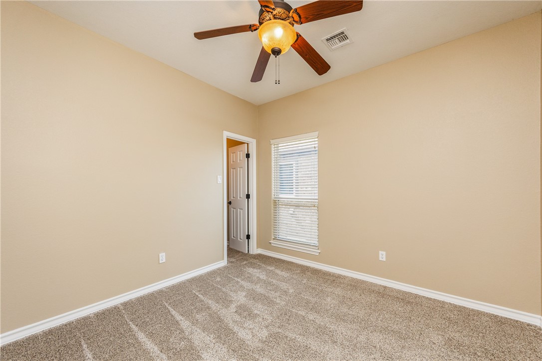 307 Heathercrest Portland, TX 78374 - Photo 31 of 40 a view of a chandelier fan in a room