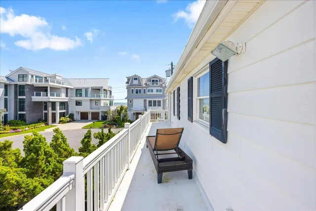 a view of balcony with furniture