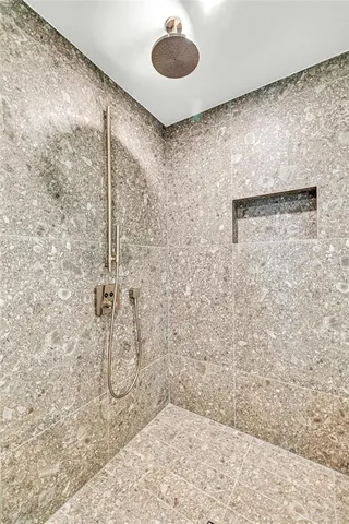 a view of a hallway with closet area