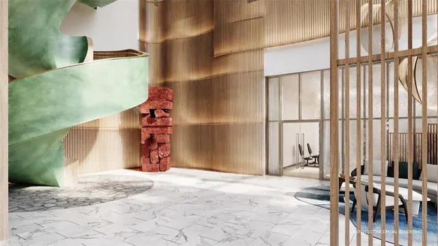 a view of a backyard with a fountain plants and palm trees