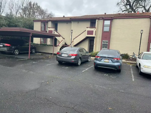 a car parked in front of a house