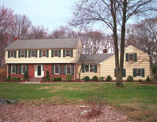 76 Maywood Road Norwalk, CT 06850 - Photo 1 of 1 front view of a house with a yard