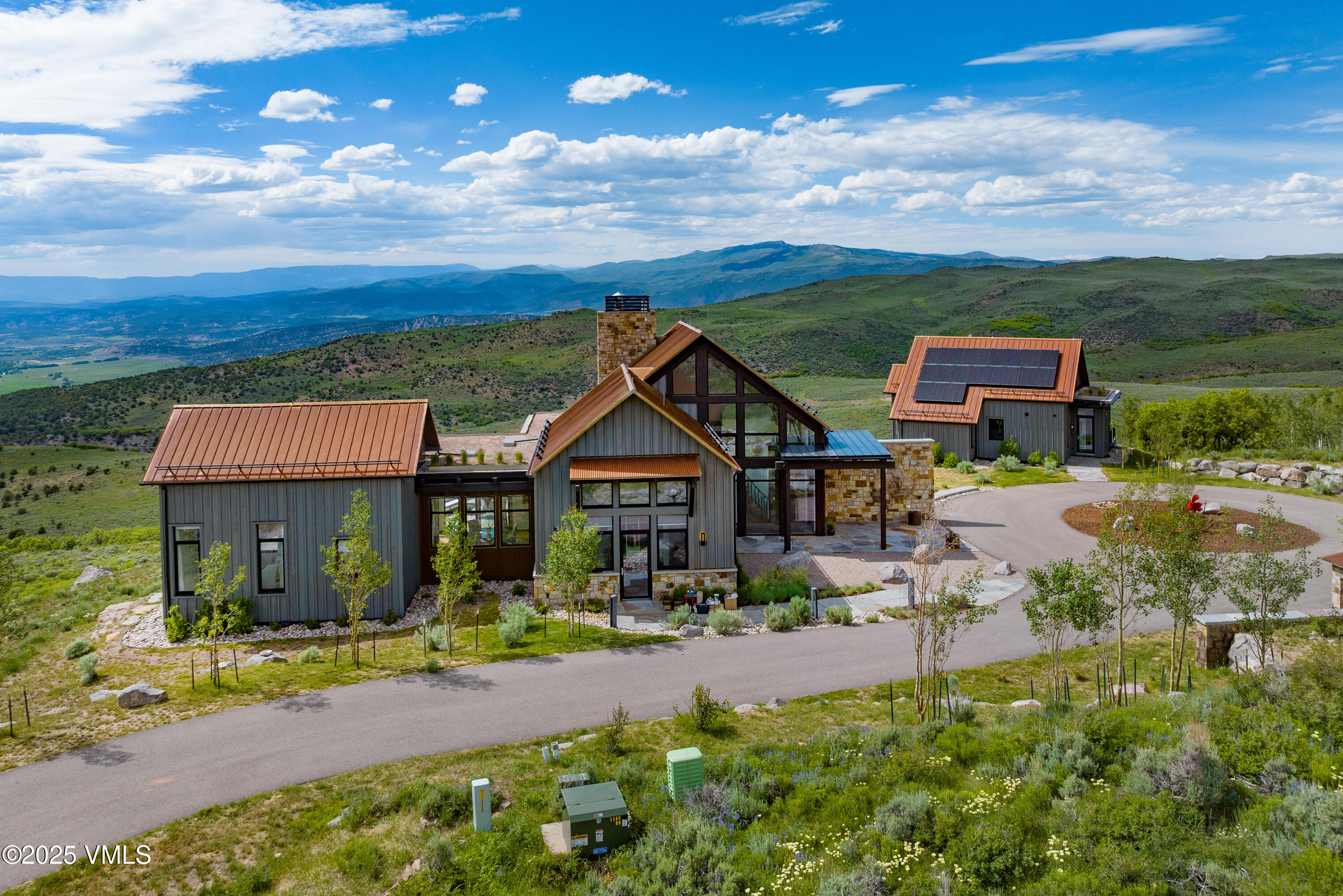 594 Winchester Trail Edwards, CO 81632 - Photo 34 of 46 a front view of a house with garden