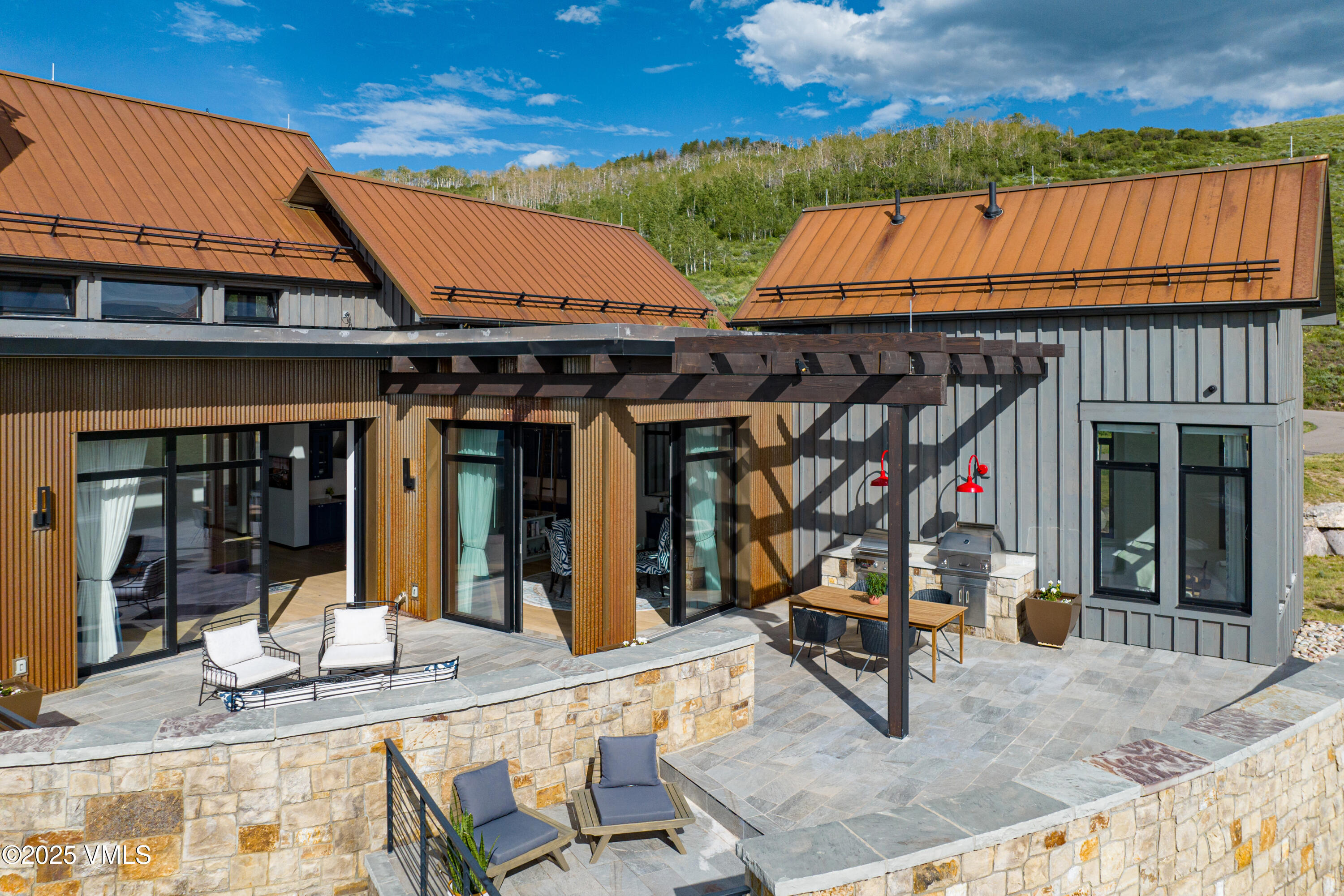 594 Winchester Trail Edwards, CO 81632 - Photo 44 of 46 a view of a dinning room with large trees and furniture