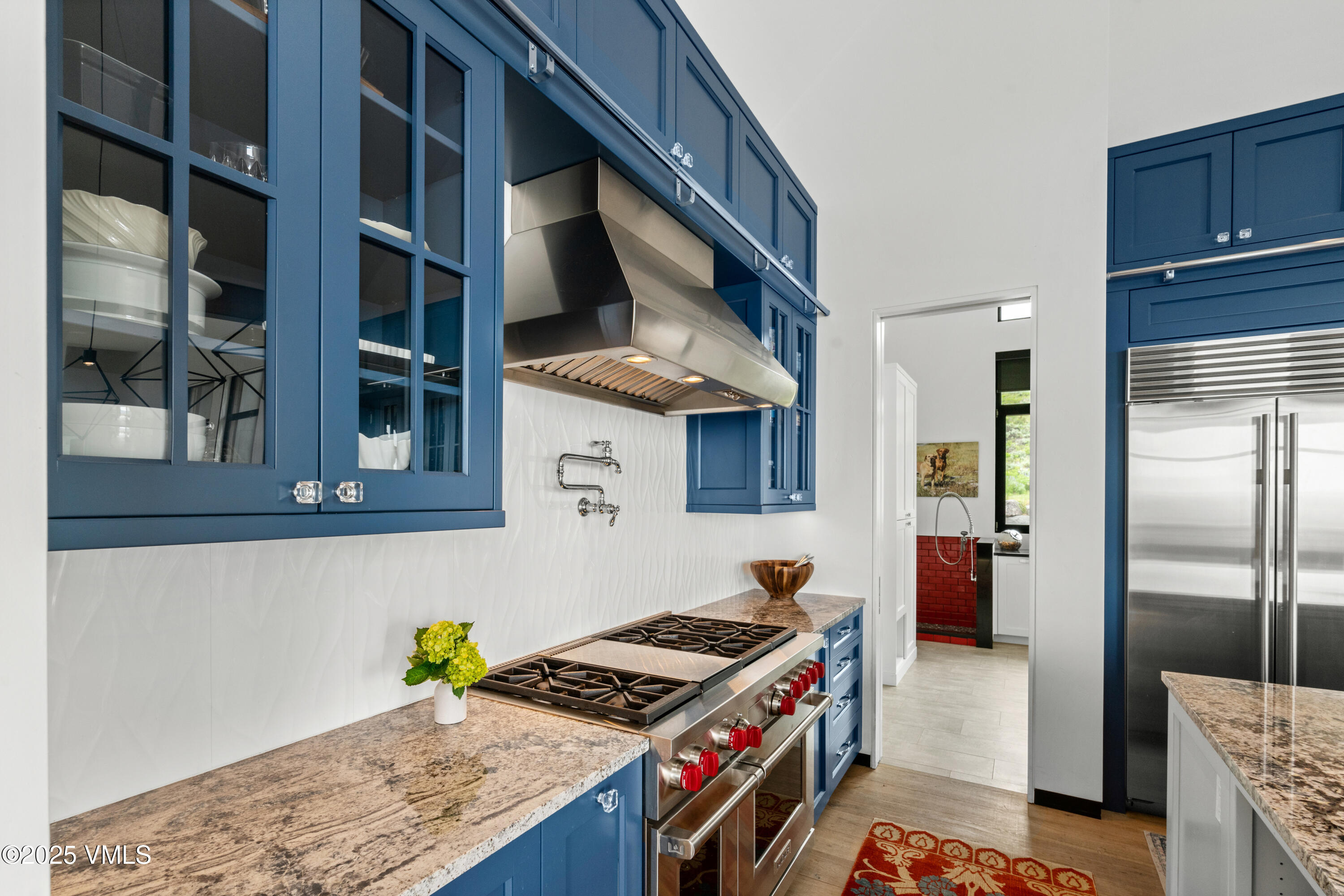 594 Winchester Trail Edwards, CO 81632 - Photo 10 of 46 a kitchen with stainless steel appliances granite countertop a stove and a refrigerator