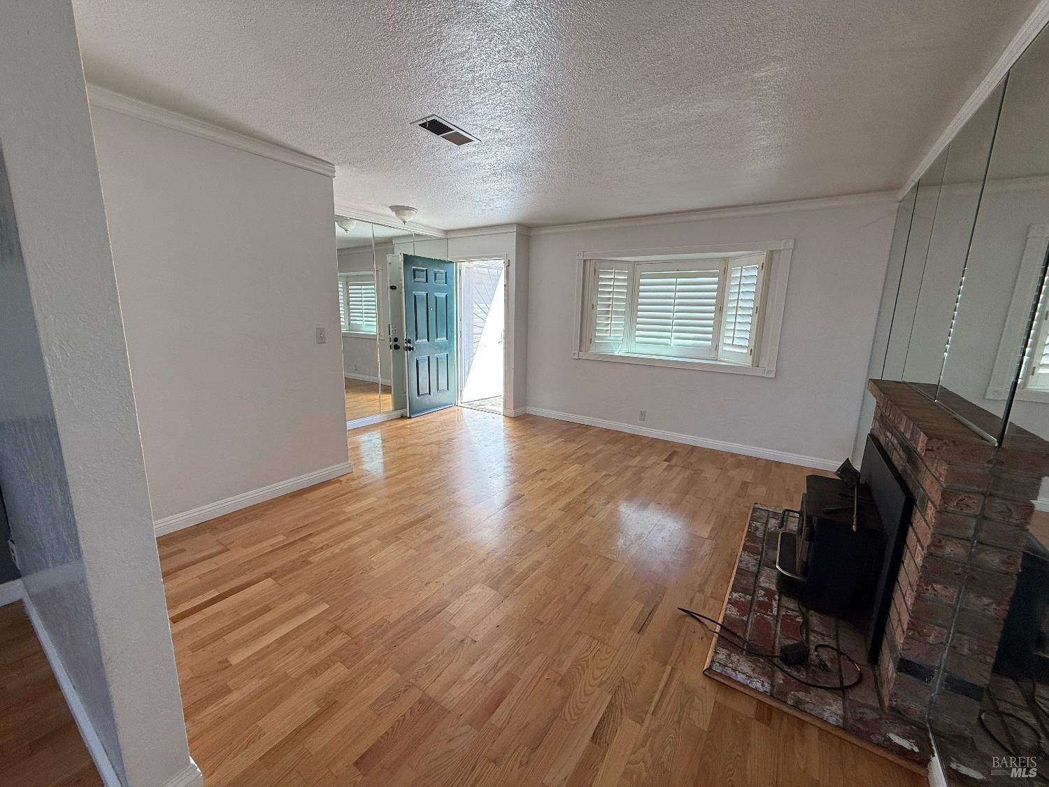 631 Inverness Drive Vallejo, CA 94589 - Photo 5 of 18 a view of a room with wooden floor and windows