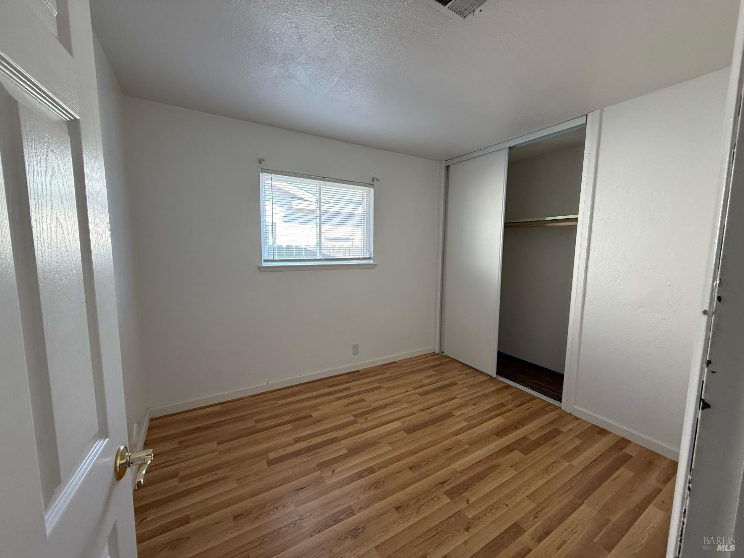 631 Inverness Drive Vallejo, CA 94589 - Photo 7 of 18 a view of empty room with wooden floor