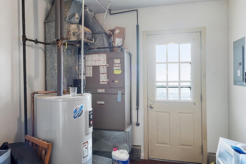 84 Century Way, Unit 84 Gardner, MA 01440 - Photo 24 of 28 a room with storage and utility