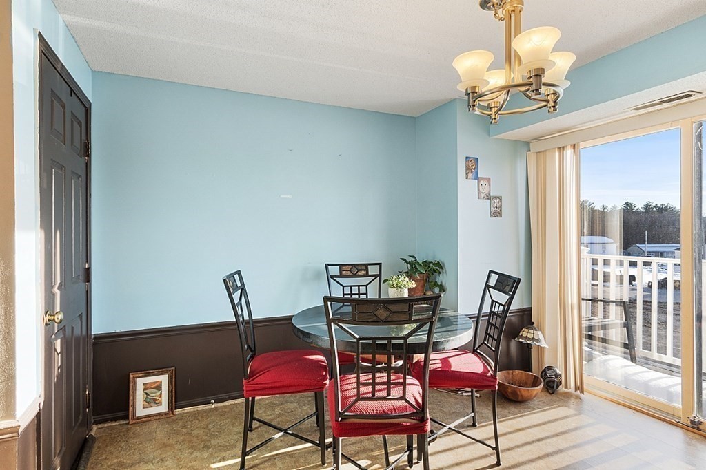 84 Century Way, Unit 84 Gardner, MA 01440 - Photo 10 of 28 a view of a room with gym equipment