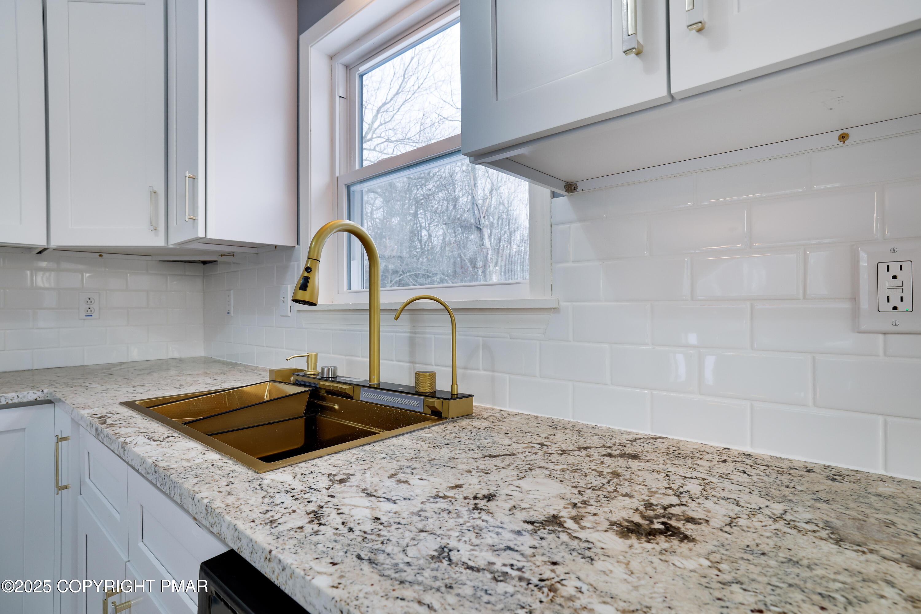 1254 Winding Way Tobyhanna, PA 18466 - Photo 13 of 46 a kitchen with granite countertop a sink a stove and cabinets