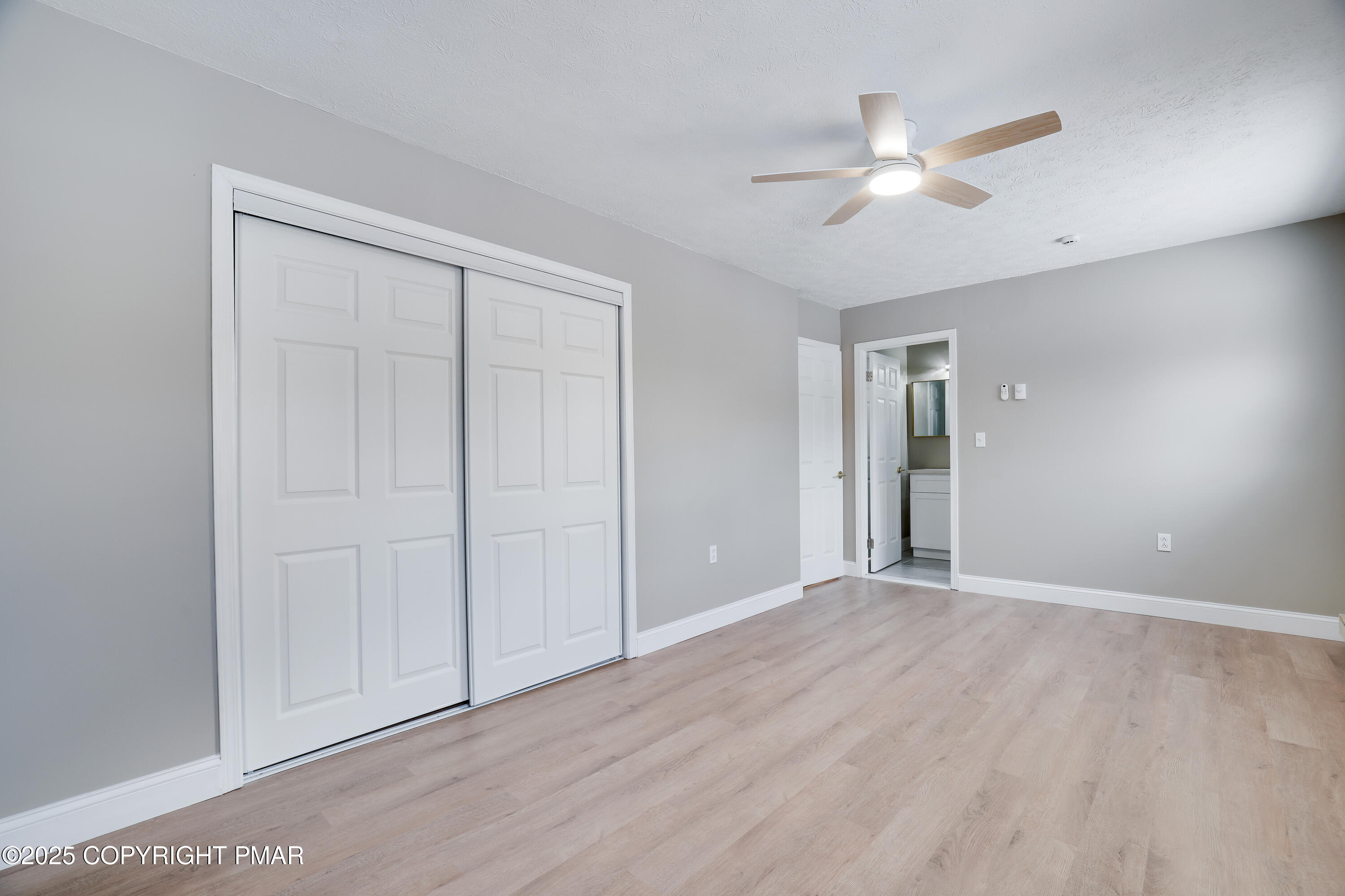 1254 Winding Way Tobyhanna, PA 18466 - Photo 22 of 46 a view of an empty room with wooden floor