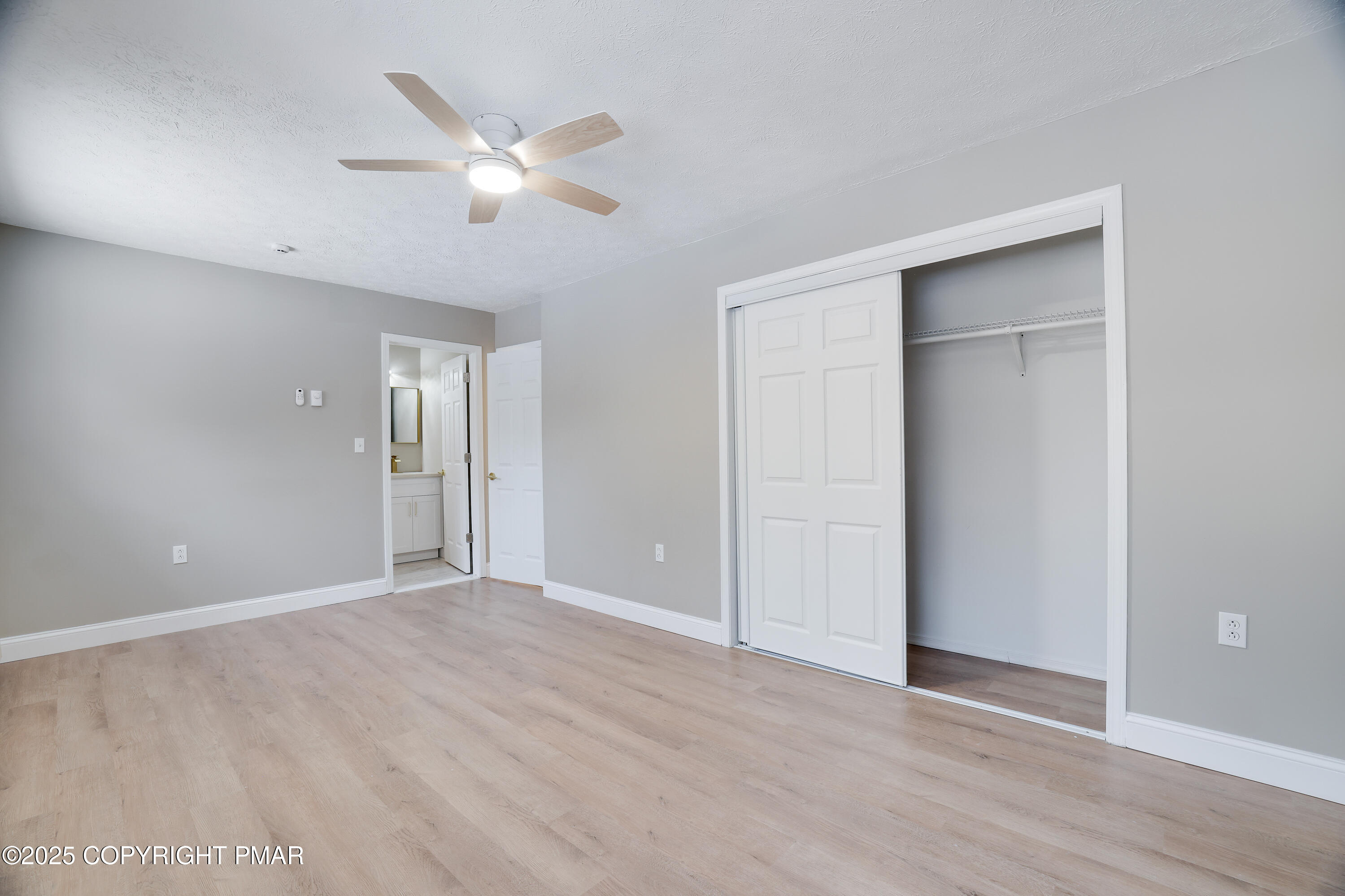 1254 Winding Way Tobyhanna, PA 18466 - Photo 26 of 46 a view of an empty room with wooden floor