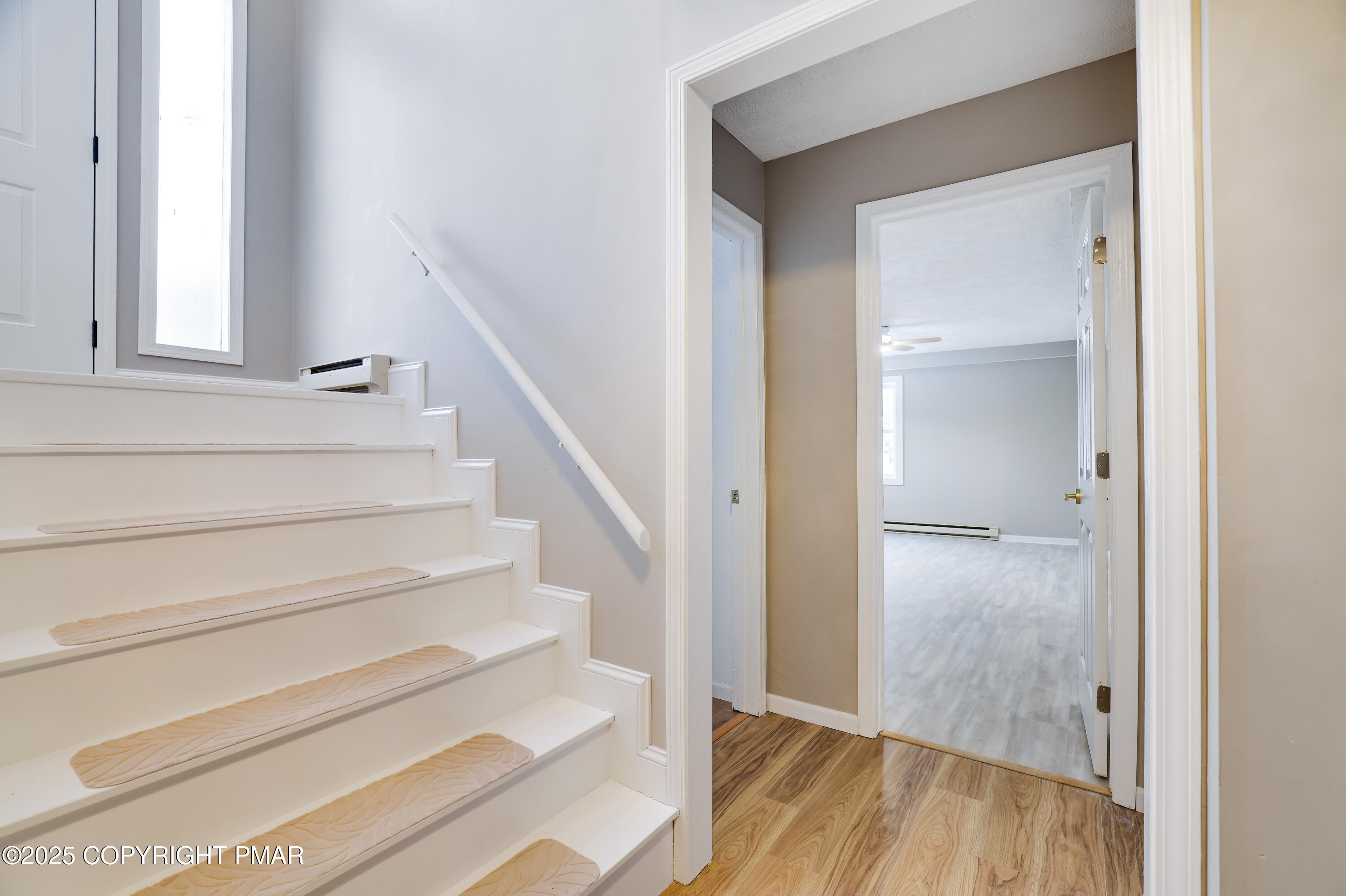 1254 Winding Way Tobyhanna, PA 18466 - Photo 27 of 46 a view of entryway with wooden floor and front door