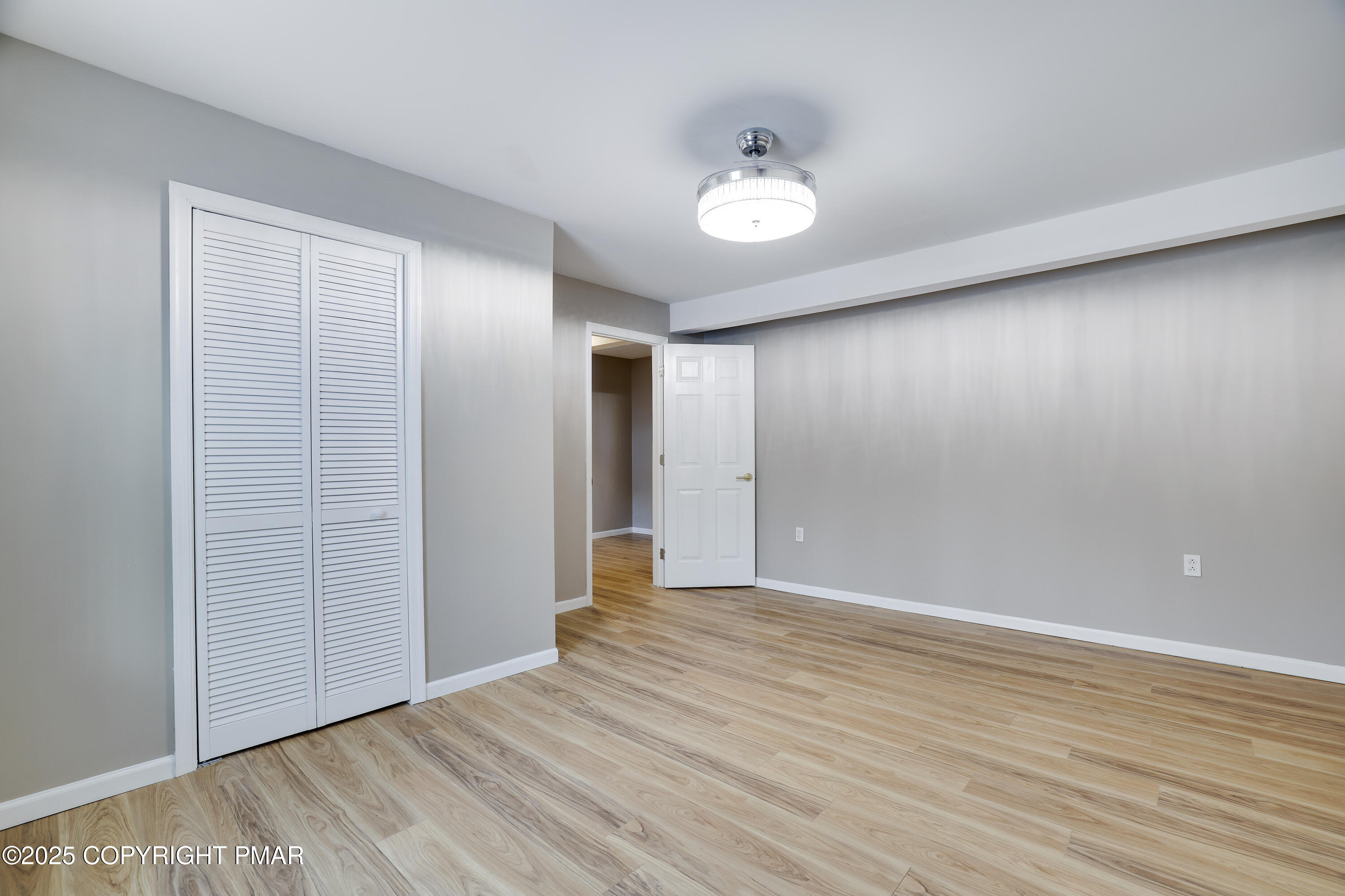 1254 Winding Way Tobyhanna, PA 18466 - Photo 33 of 46 a view of an empty room with wooden floor