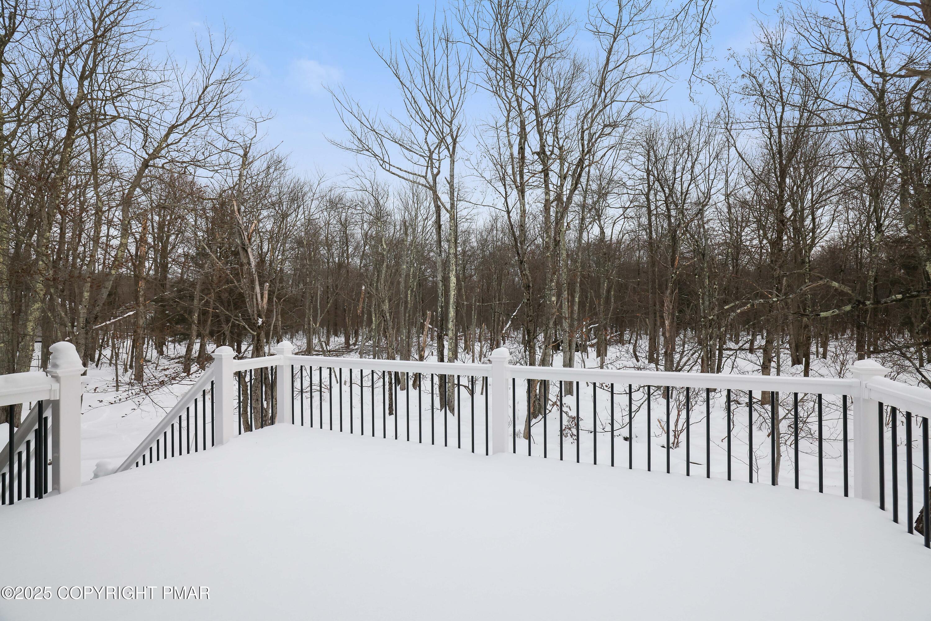 1254 Winding Way Tobyhanna, PA 18466 - Photo 36 of 46 a view of a white house with a wooden fence