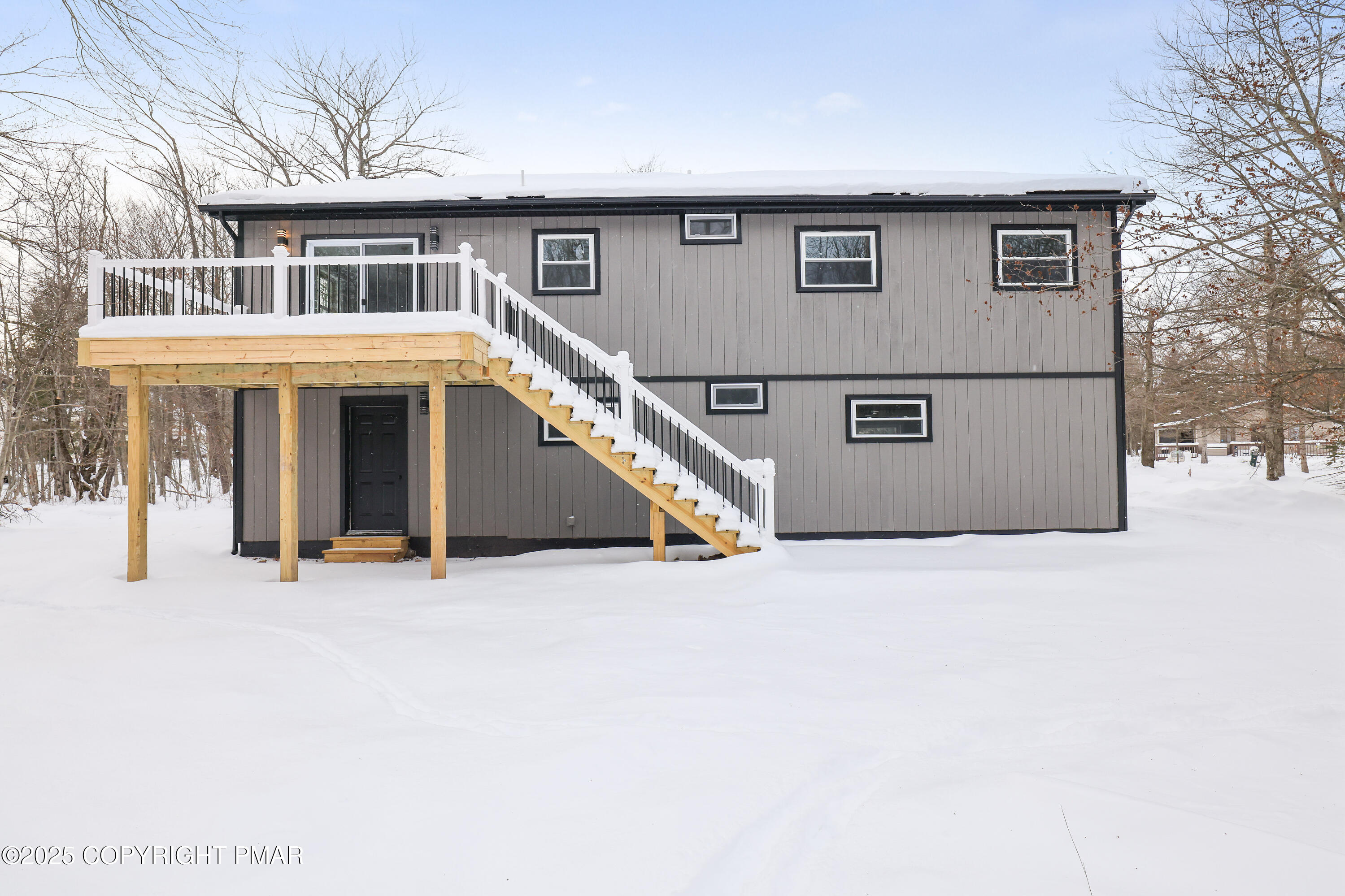 1254 Winding Way Tobyhanna, PA 18466 - Photo 39 of 46 a view of a house with a tree and wooden fence