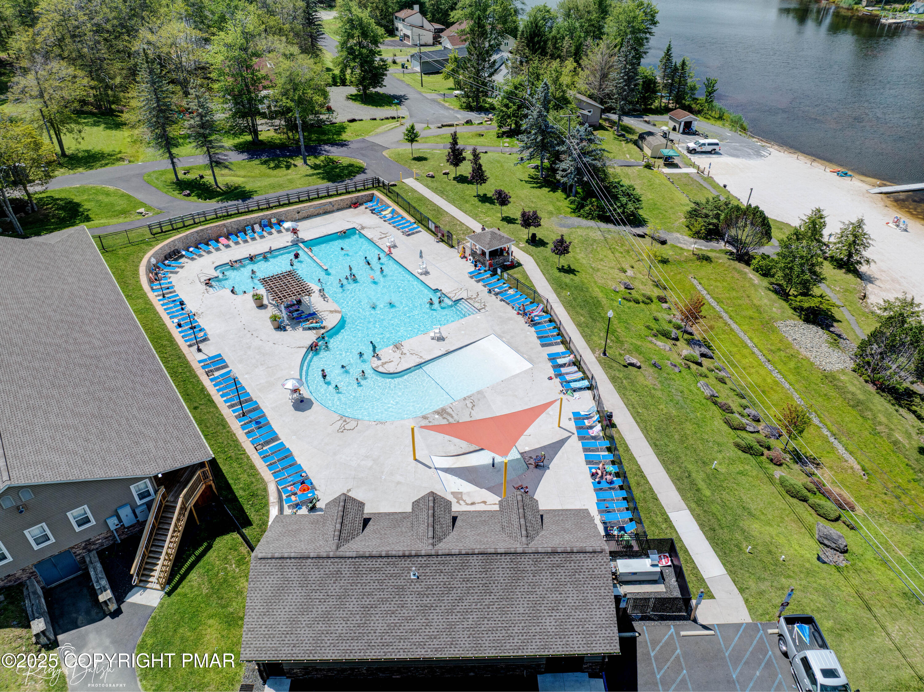 1254 Winding Way Tobyhanna, PA 18466 - Photo 42 of 46 an aerial view of a house with a yard and lake view