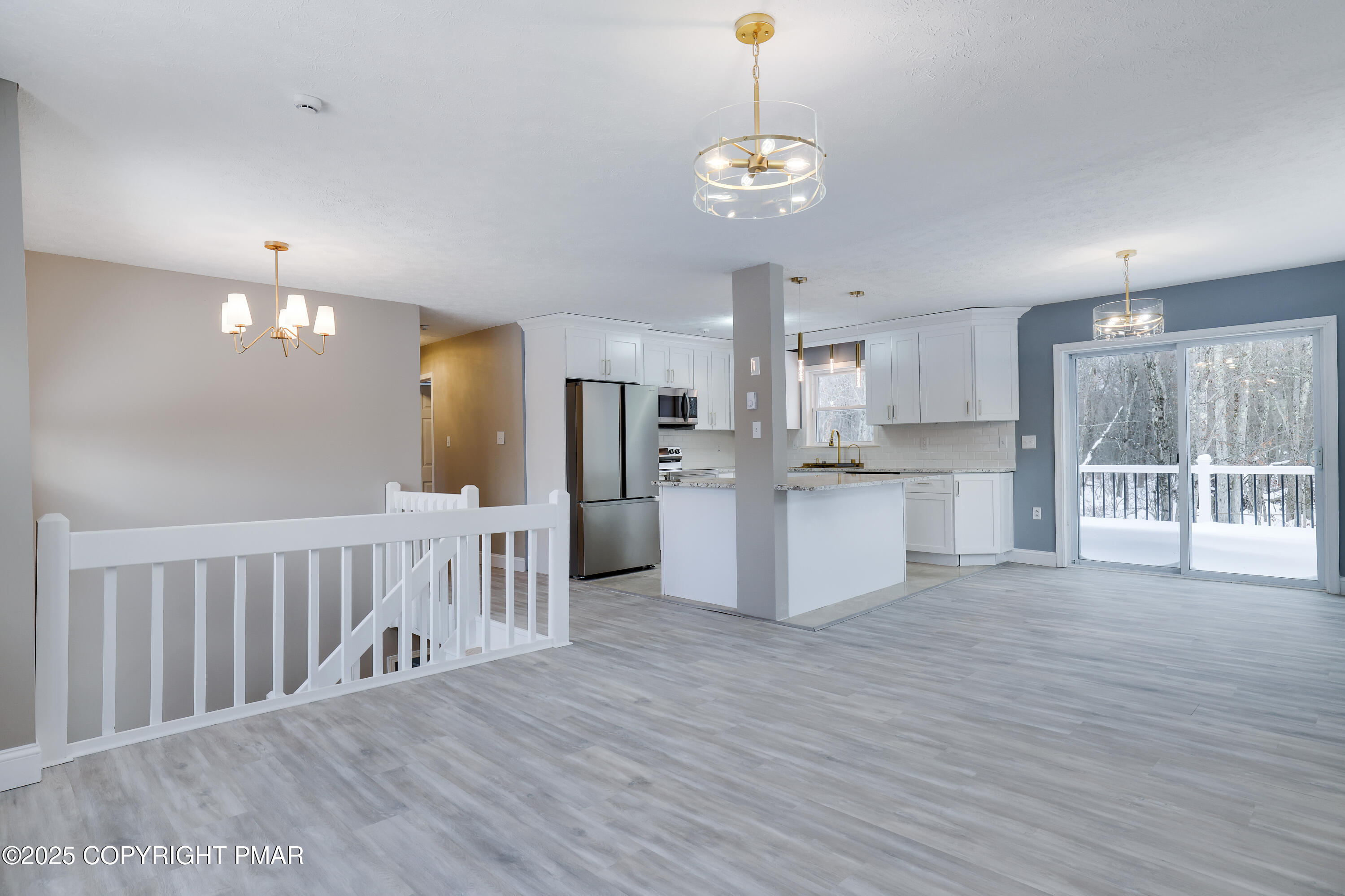 1254 Winding Way Tobyhanna, PA 18466 - Photo 8 of 46 a view of kitchen with refrigerator microwave and wooden floor