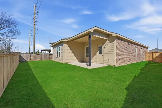 a view of a backyard with a garden