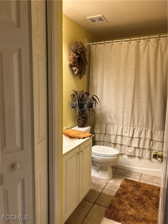 9460 Ivy Brook Run, Unit 705 Fort Myers, FL 33913 - Photo 7 of 10 a bathroom with a toilet a sink and tub