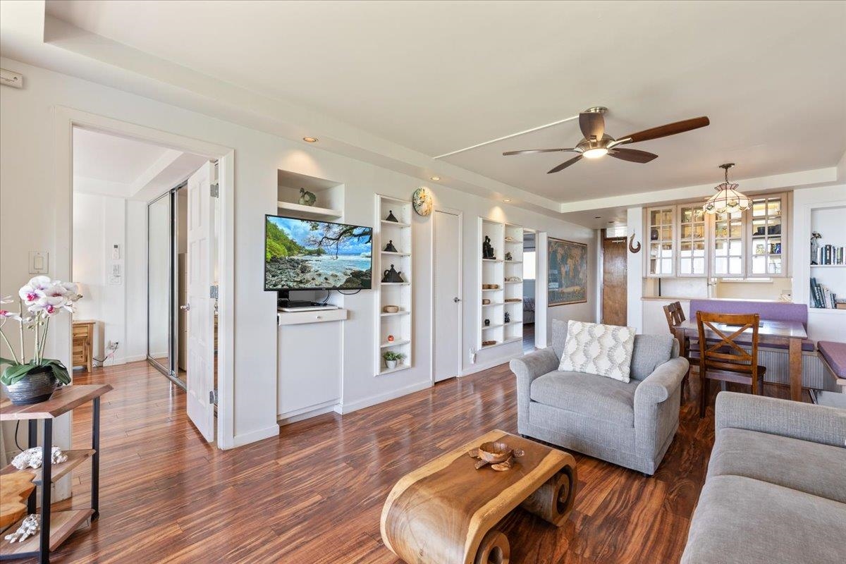 760 South Kihei Road, Unit 422 Kihei, HI 96753 - Photo 9 of 34 a living room with furniture and wooden floor