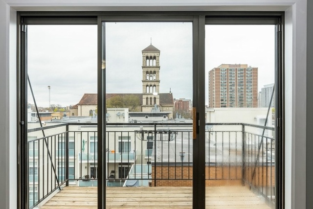 4144 North Sheridan Road, Unit 609 Chicago, IL 60613 - Photo 16 of 17 a view of a city from a window