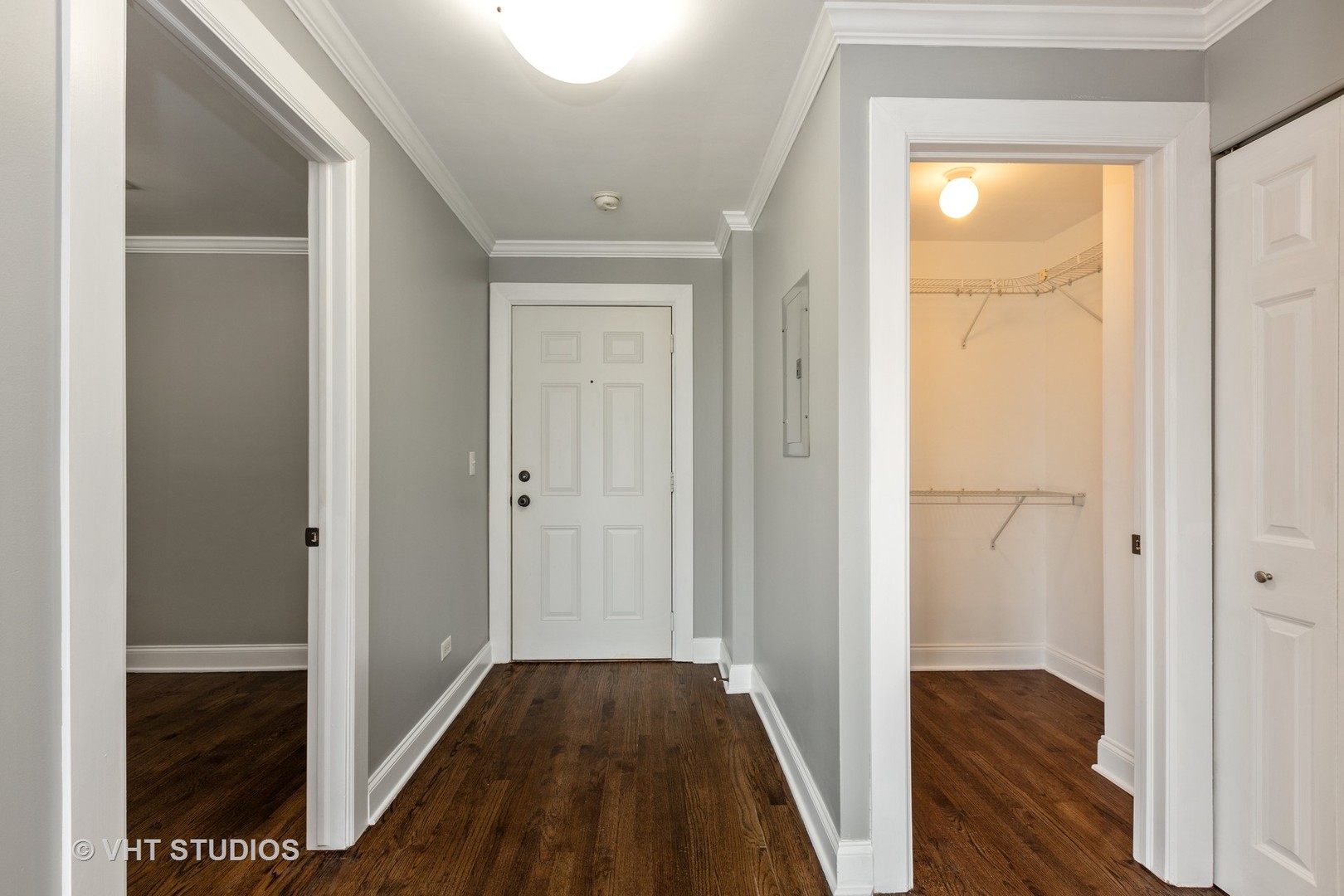 4144 North Sheridan Road, Unit 609 Chicago, IL 60613 - Photo 4 of 17 a view of a hallway with wooden floor and closet
