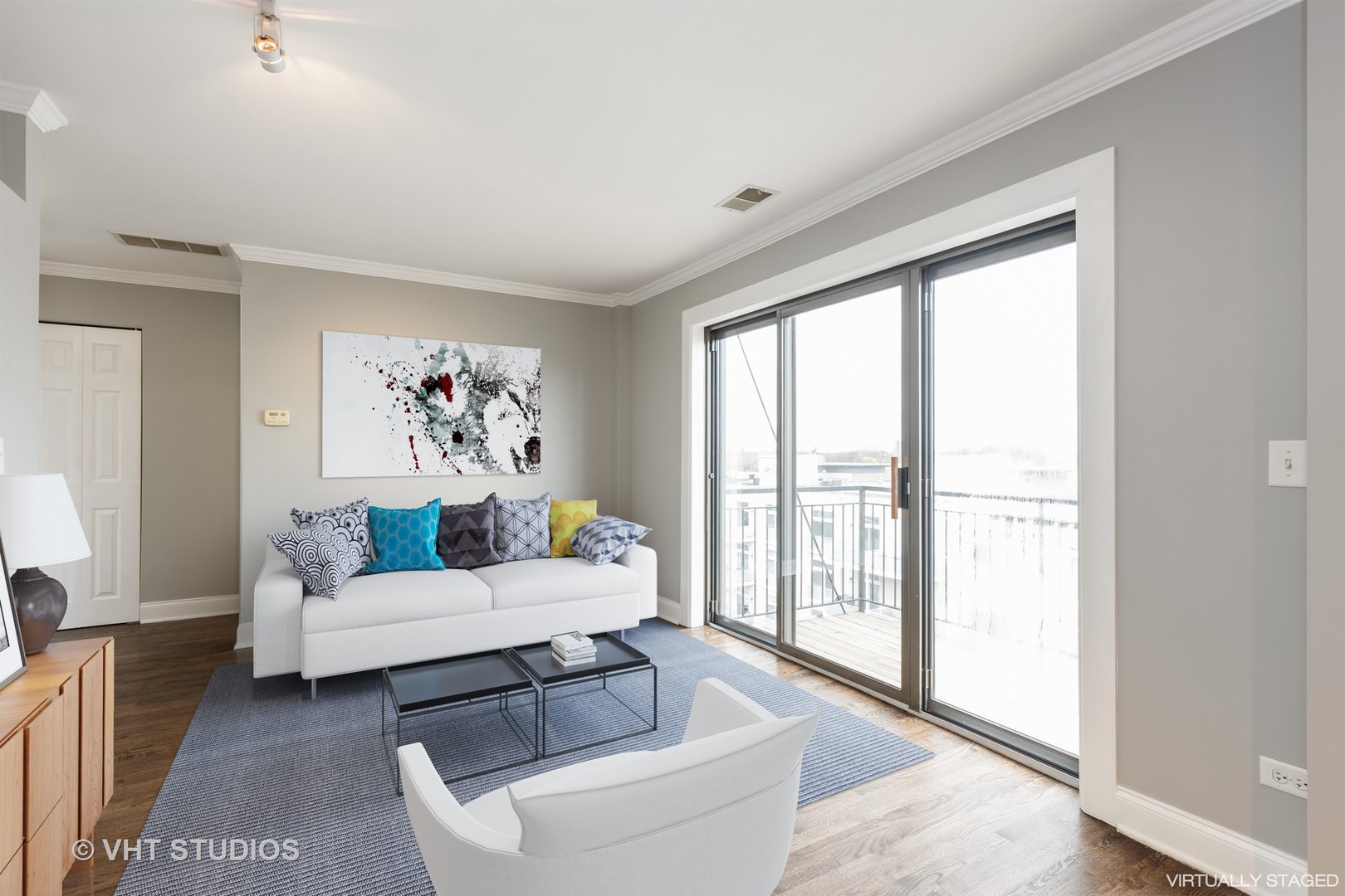 4144 North Sheridan Road, Unit 609 Chicago, IL 60613 - Photo 5 of 17 a living room with furniture and a large window