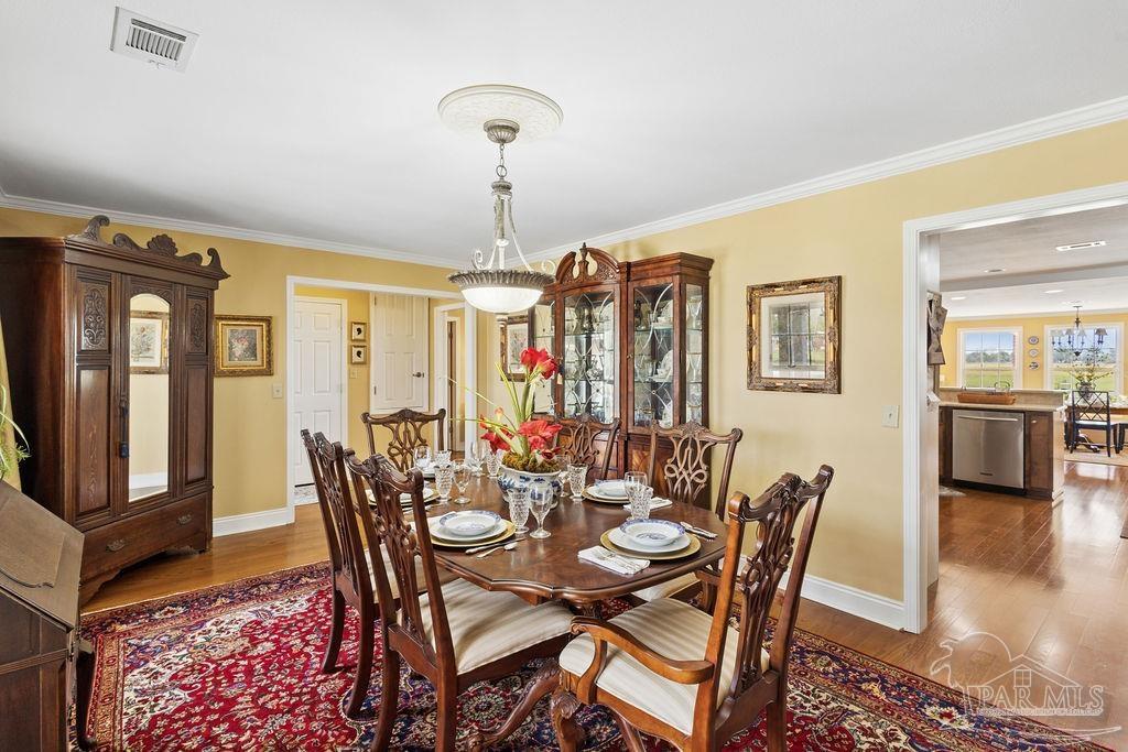 5160 Max Lane Jay, FL 32565 - Photo 11 of 54 a view of a dining room with furniture