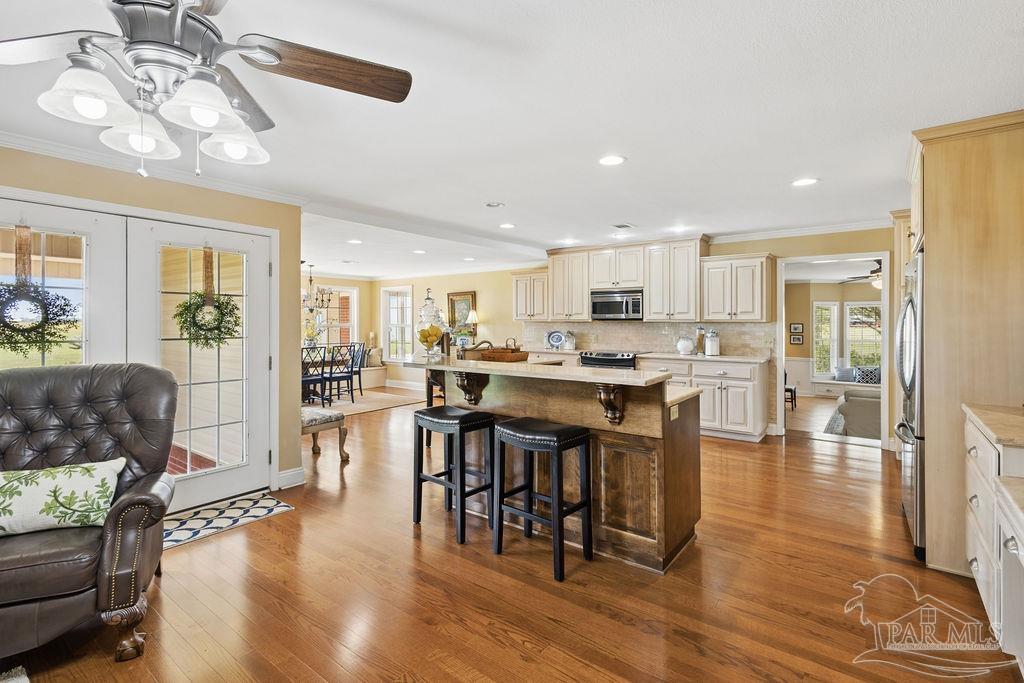 5160 Max Lane Jay, FL 32565 - Photo 17 of 54 a view of kitchen with dining table and chairs