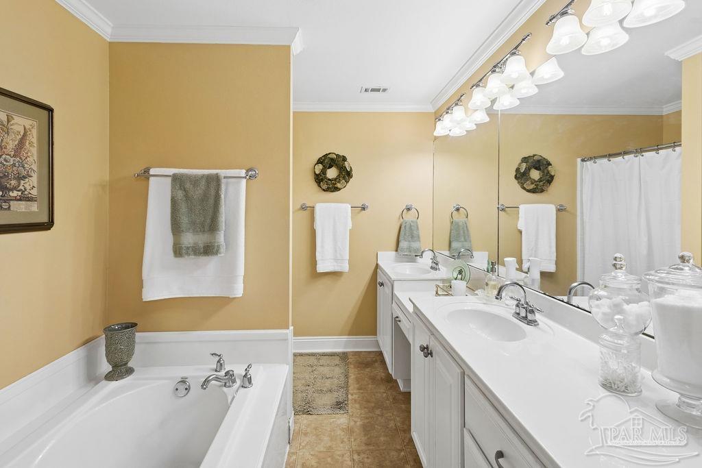 5160 Max Lane Jay, FL 32565 - Photo 23 of 54 a bathroom with a bathtub sink and mirror