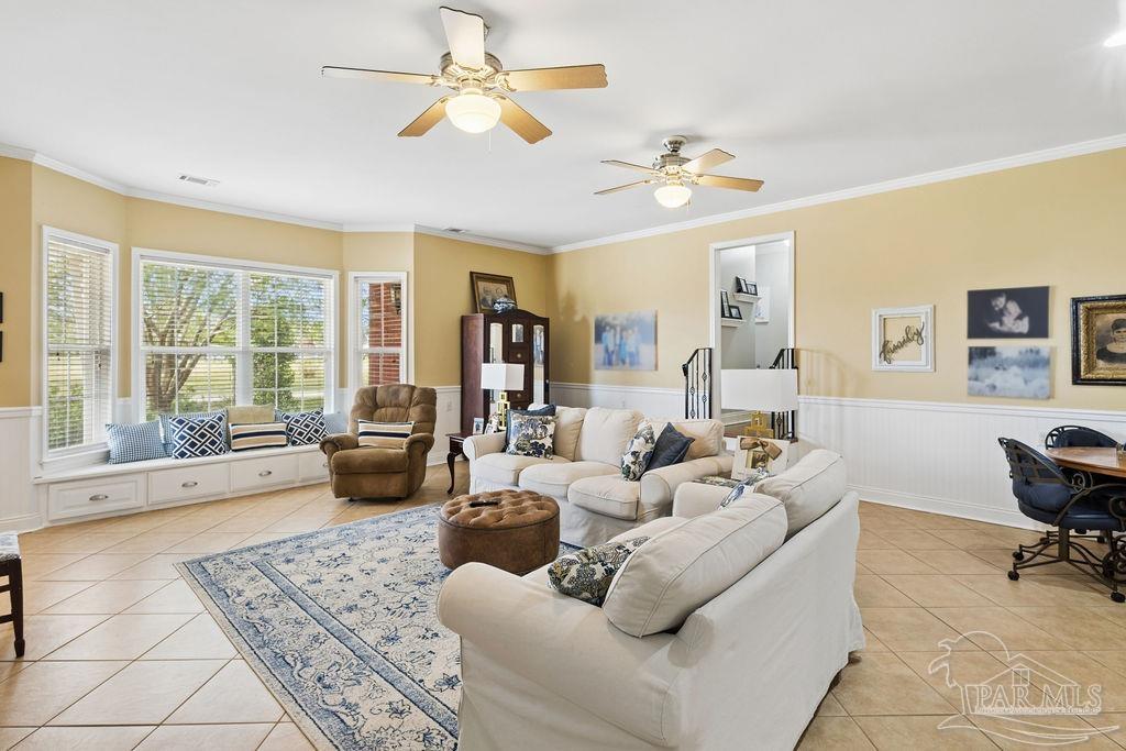 5160 Max Lane Jay, FL 32565 - Photo 26 of 54 a living room with furniture ceiling fan and a rug
