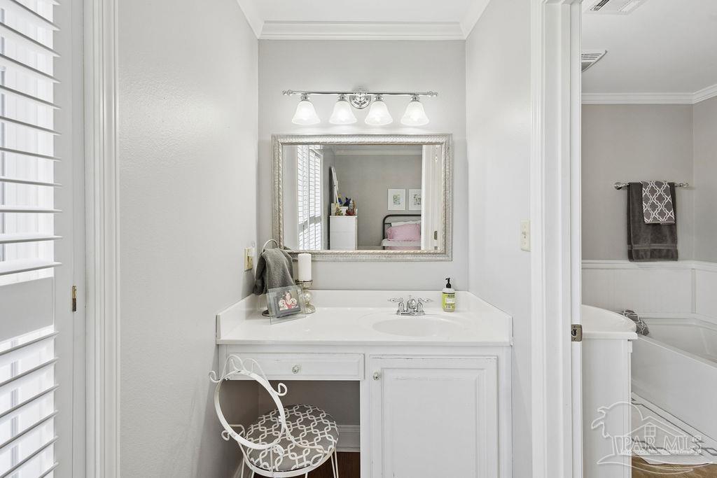 5160 Max Lane Jay, FL 32565 - Photo 30 of 54 a bathroom with a sink and a mirror