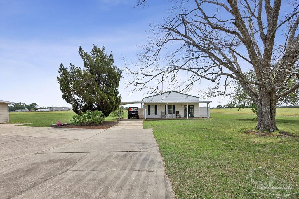 5160 Max Lane Jay, FL 32565 - Photo 33 of 54 a front view of a house with garden