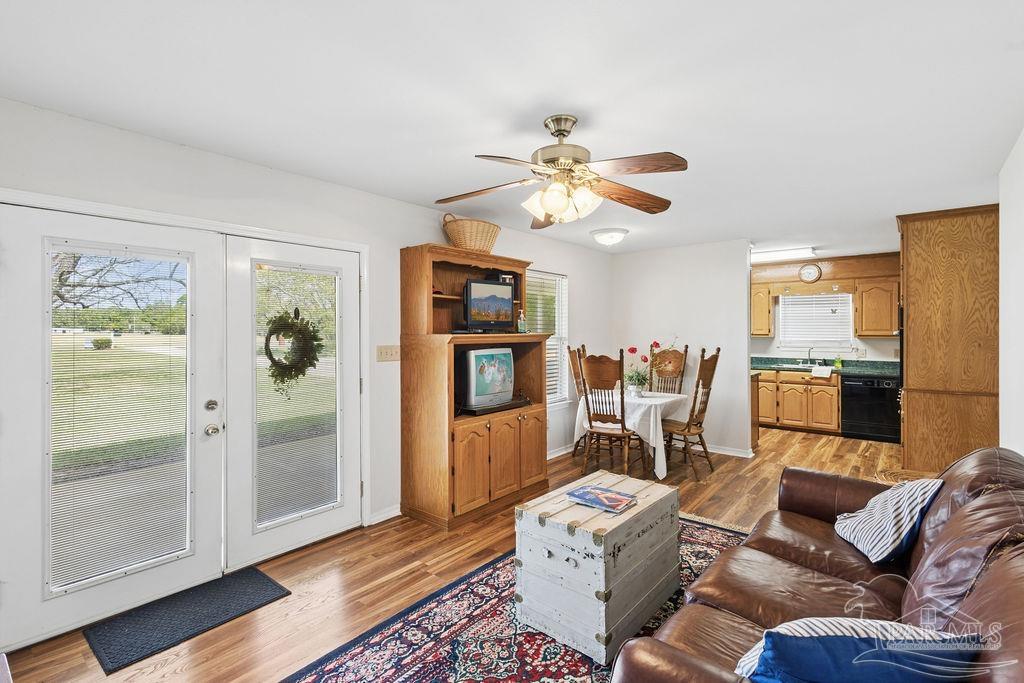 5160 Max Lane Jay, FL 32565 - Photo 34 of 54 a living room with furniture and a wooden floor