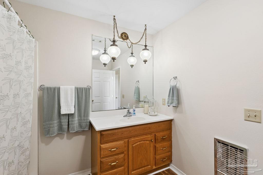 5160 Max Lane Jay, FL 32565 - Photo 38 of 54 a bathroom with a sink vanity and a mirror