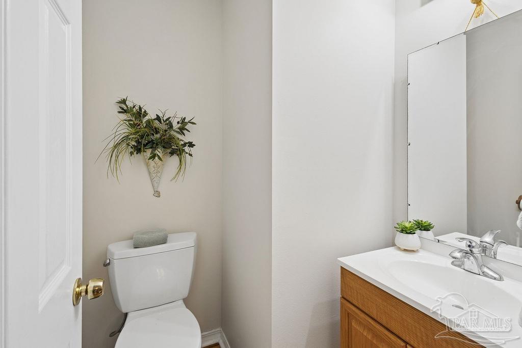 5160 Max Lane Jay, FL 32565 - Photo 41 of 54 a bathroom with a sink toilet and a mirror