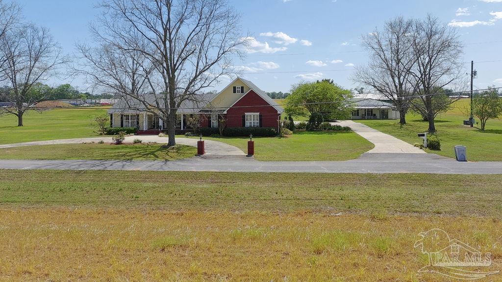 5160 Max Lane Jay, FL 32565 - Photo 54 of 54 a garden with trees in the background