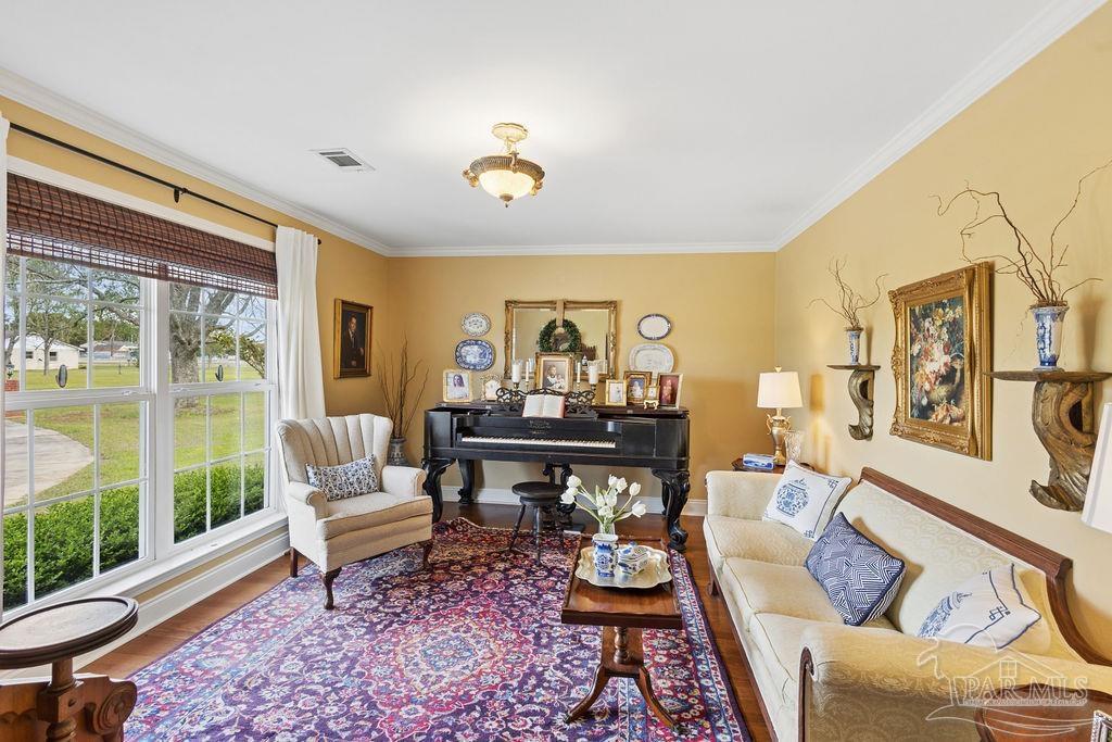 5160 Max Lane Jay, FL 32565 - Photo 10 of 54 a living room with furniture and a large window