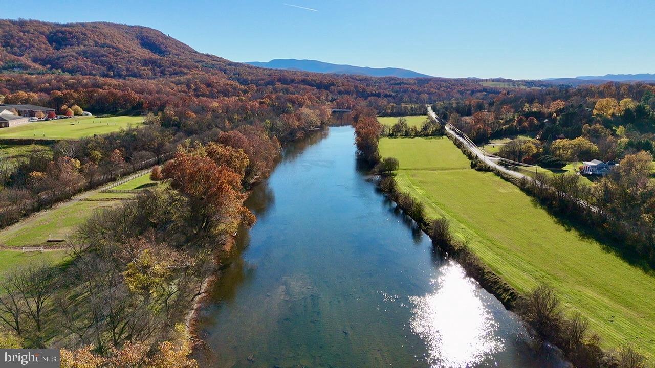 198 Heim-Jones Road Linden, VA 22642 - Photo 4 of 38 a view of a lake with mountains in the background