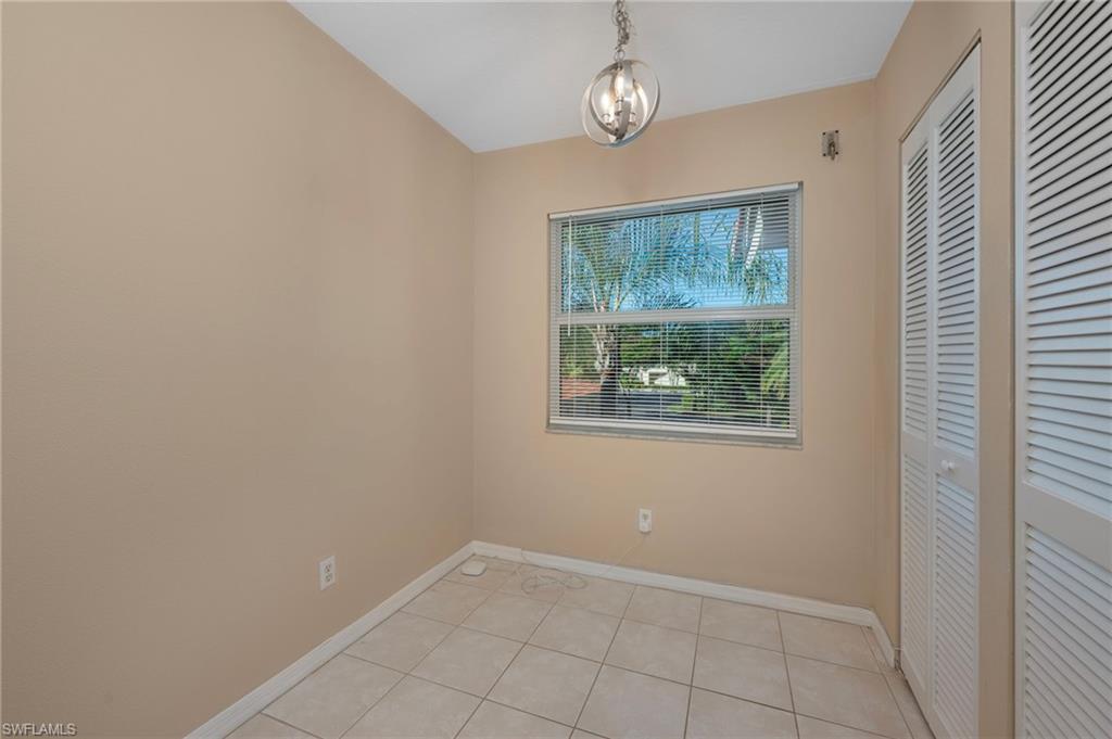 6610 Huntington Lakes Circle, Unit 203 Naples, FL 34119 - Photo 10 of 18 Versatile space for eating, working, or lounging