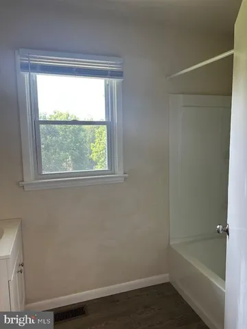 a bathroom with a bathtub
