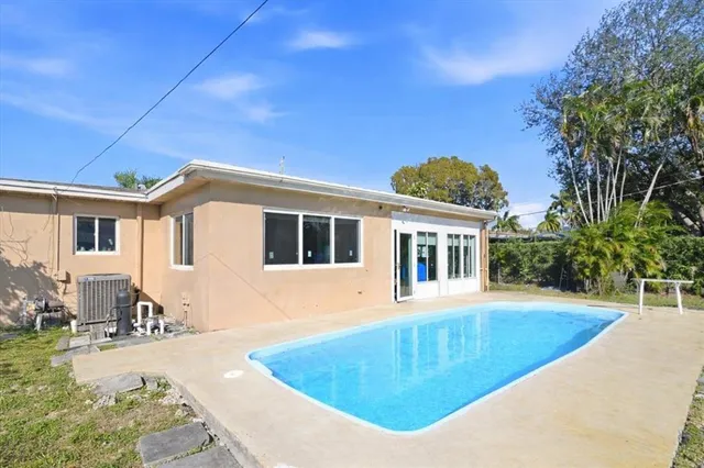 a view of a house with pool