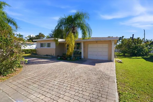 a front view of a house having yard