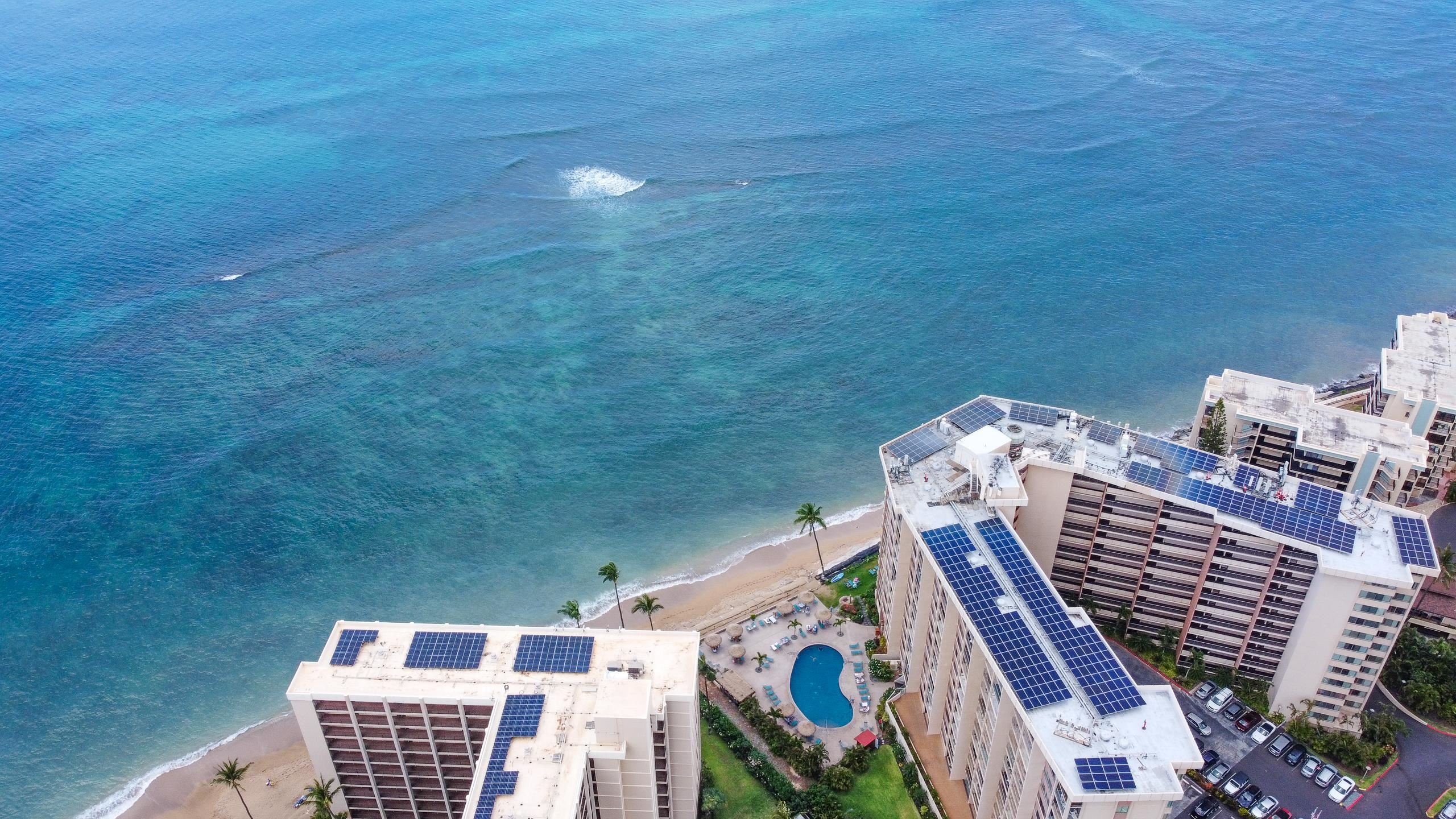 4365 Lower Honoapiilani Road, Unit 1008 Lahaina, HI 96761 - Photo 18 of 31 a view of a roof deck with wooden floor