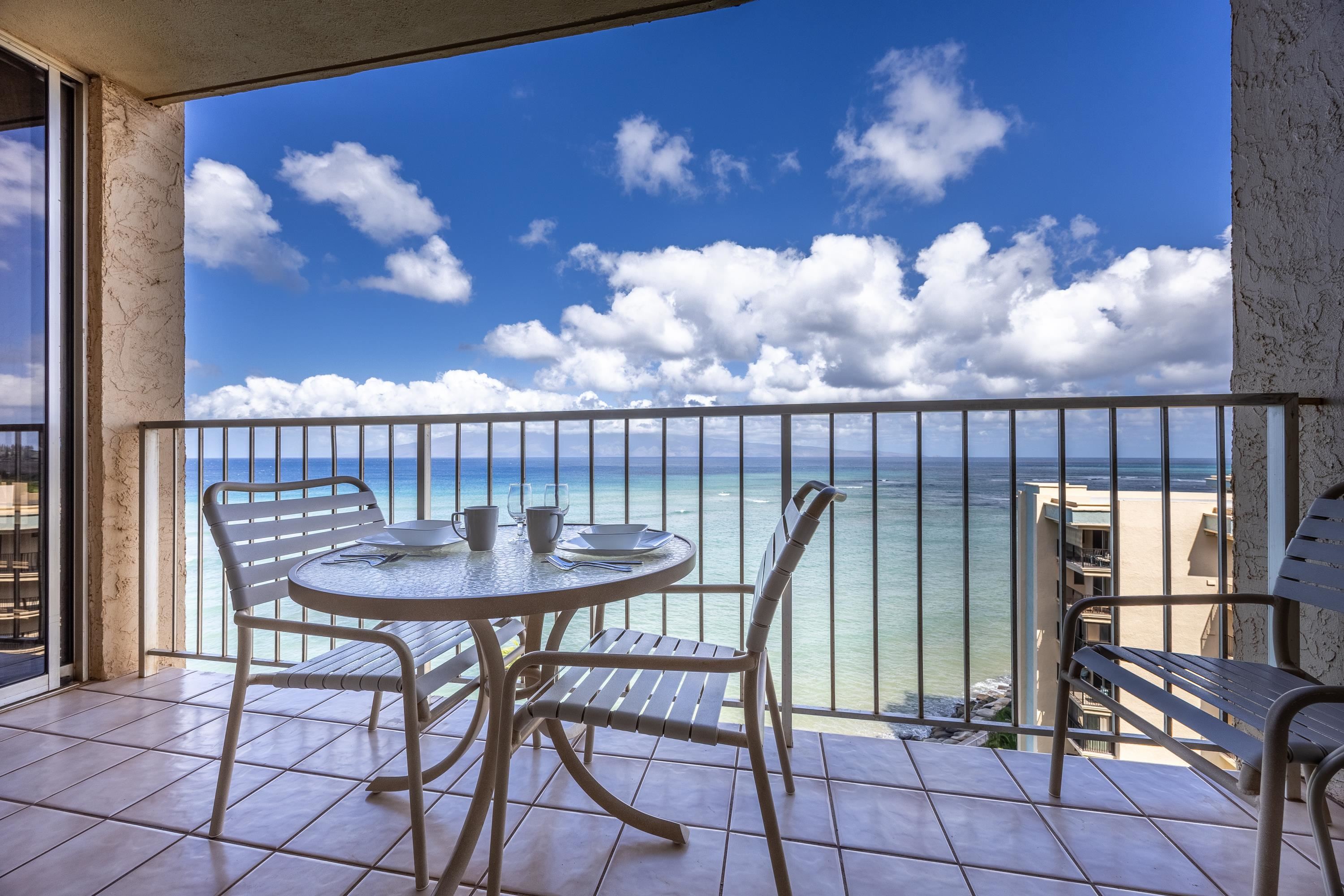4365 Lower Honoapiilani Road, Unit 1008 Lahaina, HI 96761 - Photo 2 of 31 a view of a balcony with a table and chairs