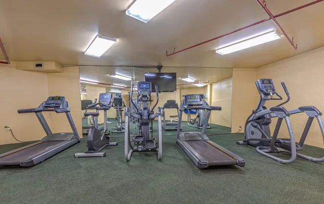 a view of a room with gym equipment