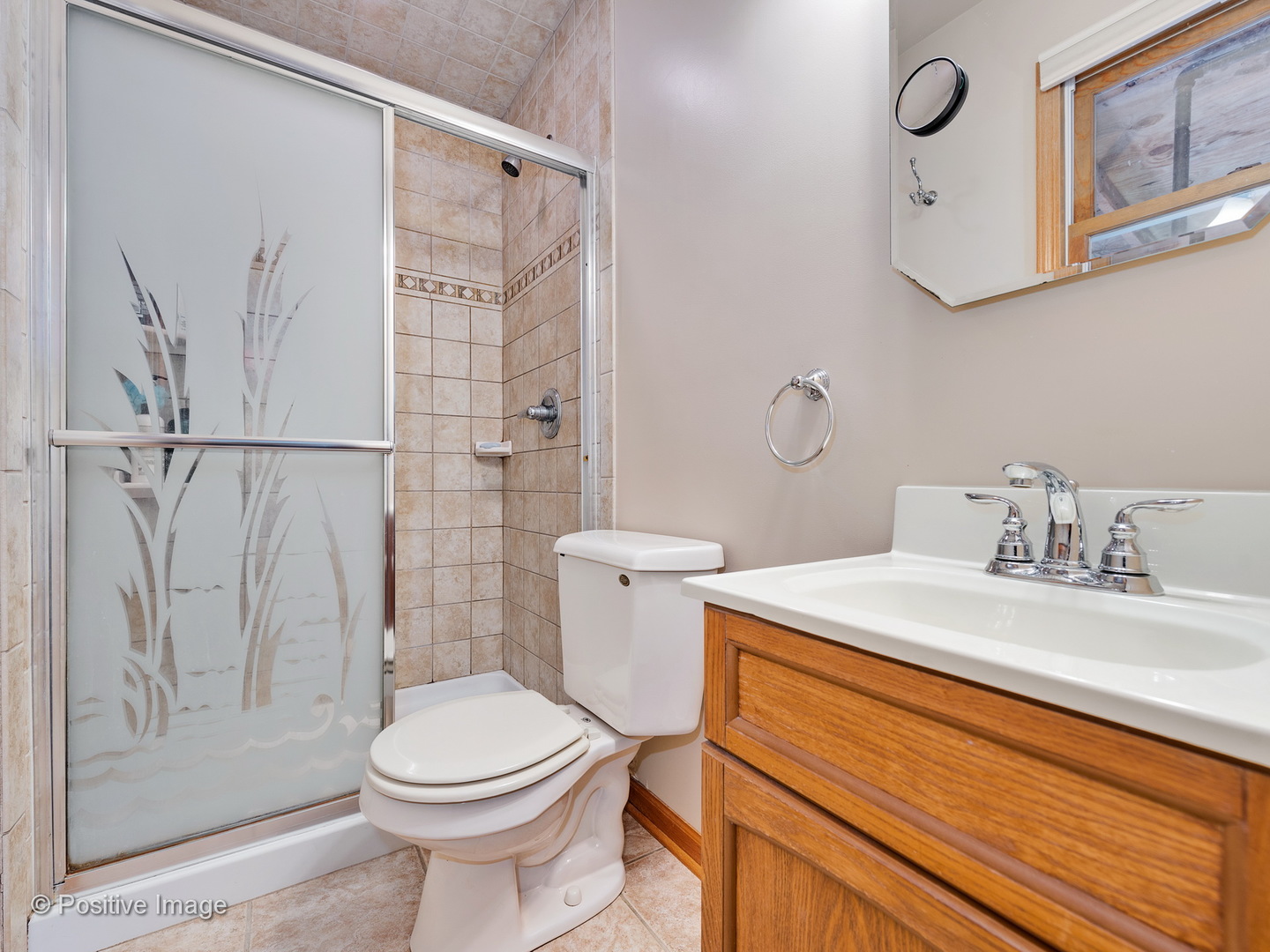 616 South Cooper Road New Lenox, IL 60451 - Photo 14 of 24 a bathroom with a sink a toilet and shower
