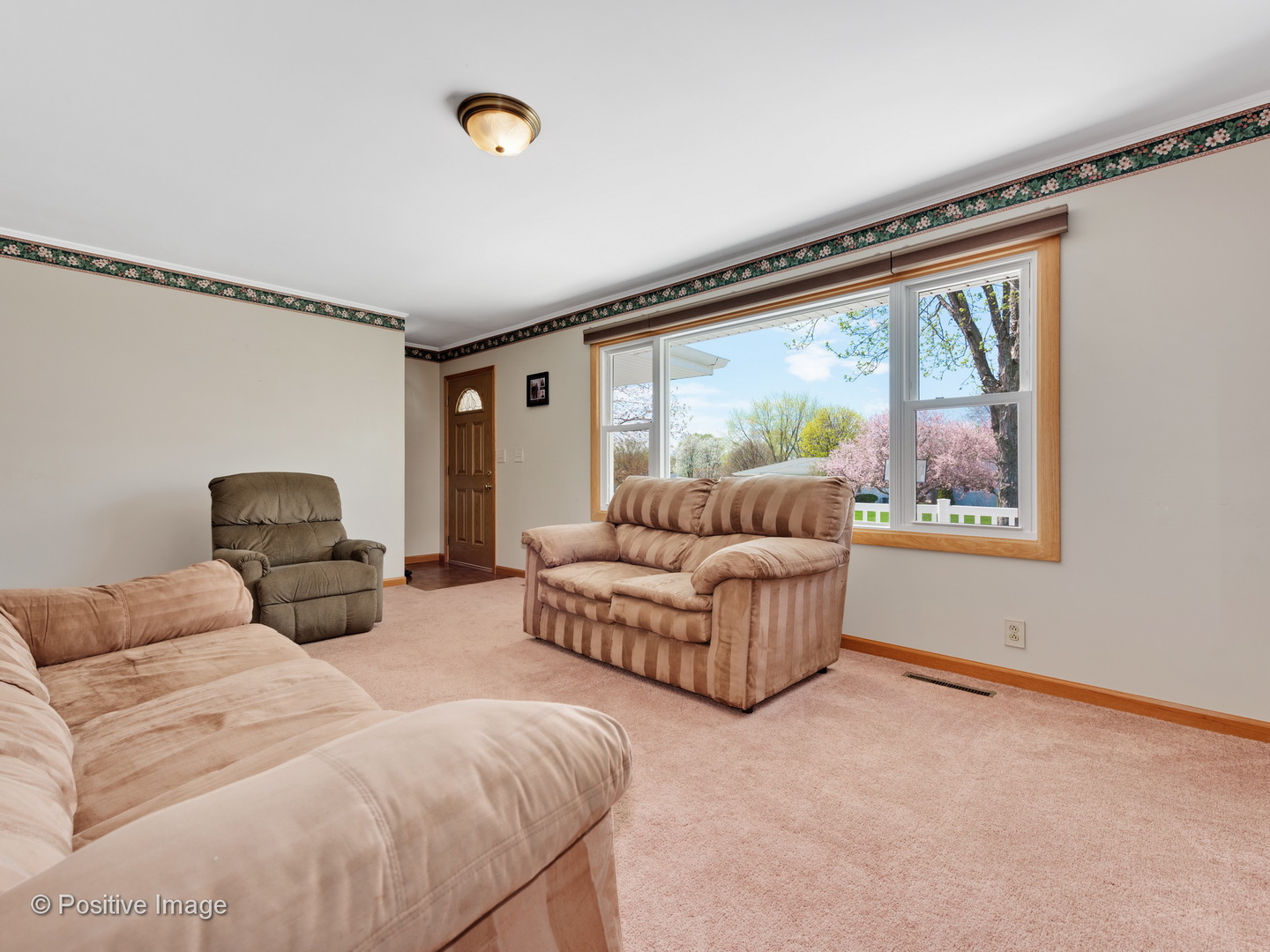 616 South Cooper Road New Lenox, IL 60451 - Photo 3 of 24 a living room with furniture and a large window
